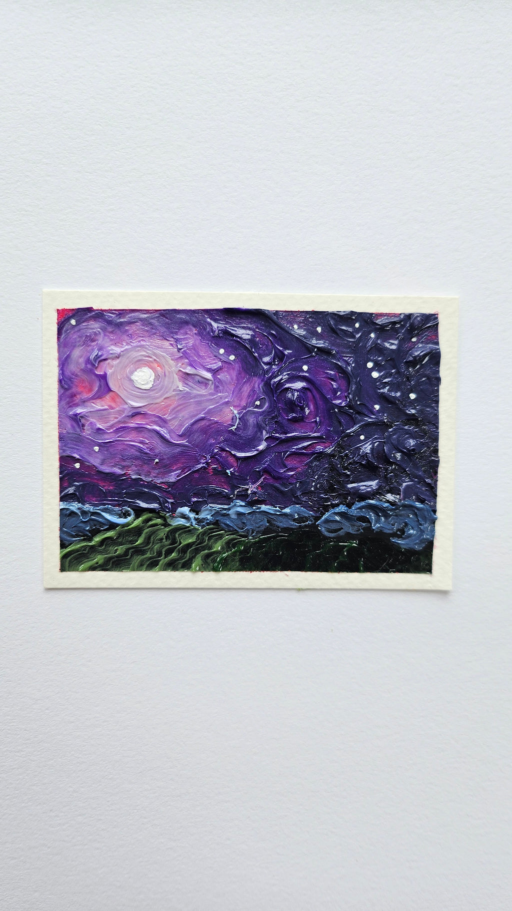 Mini painting of a moonlit field