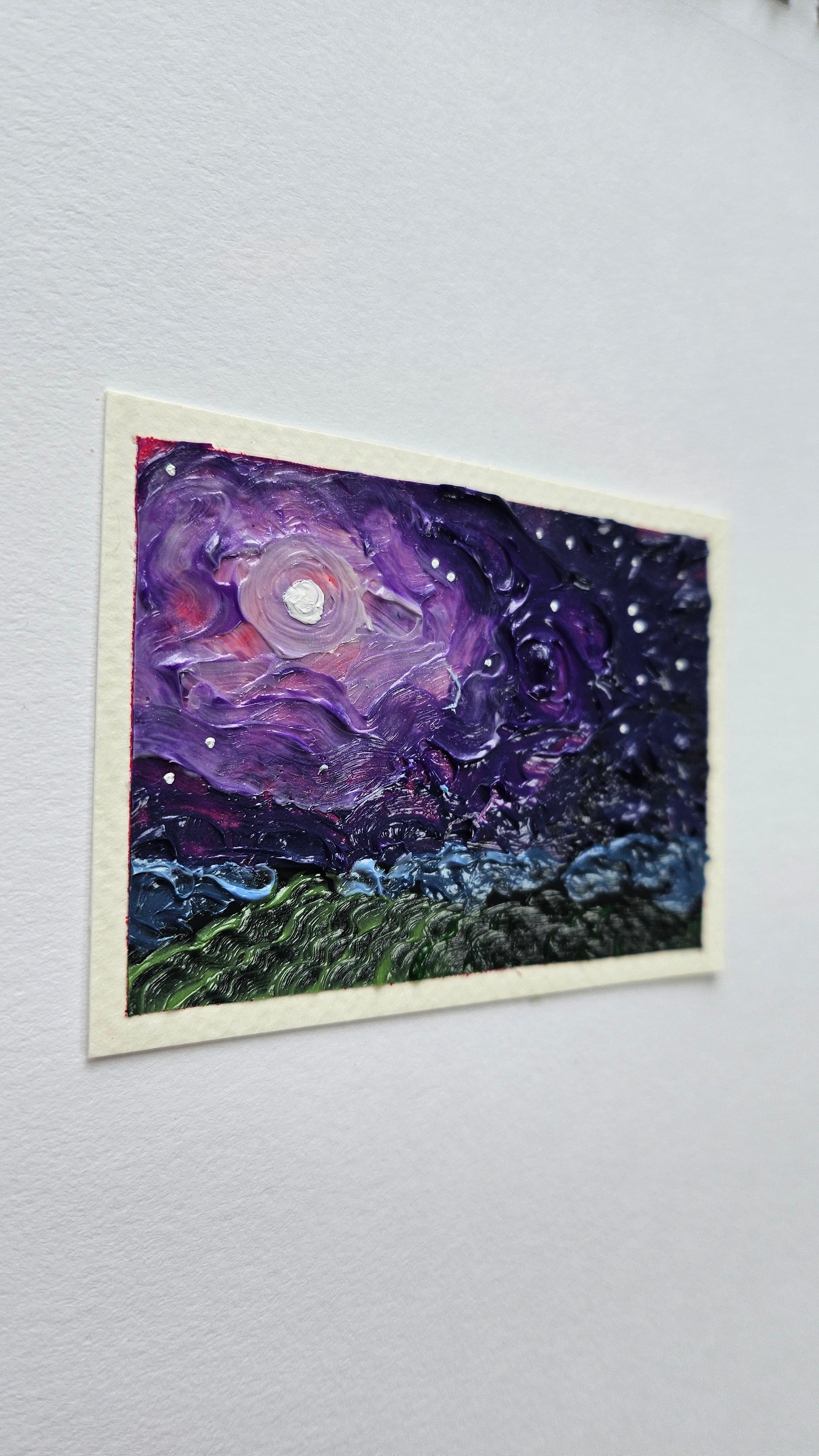 Mini painting of a moonlit field