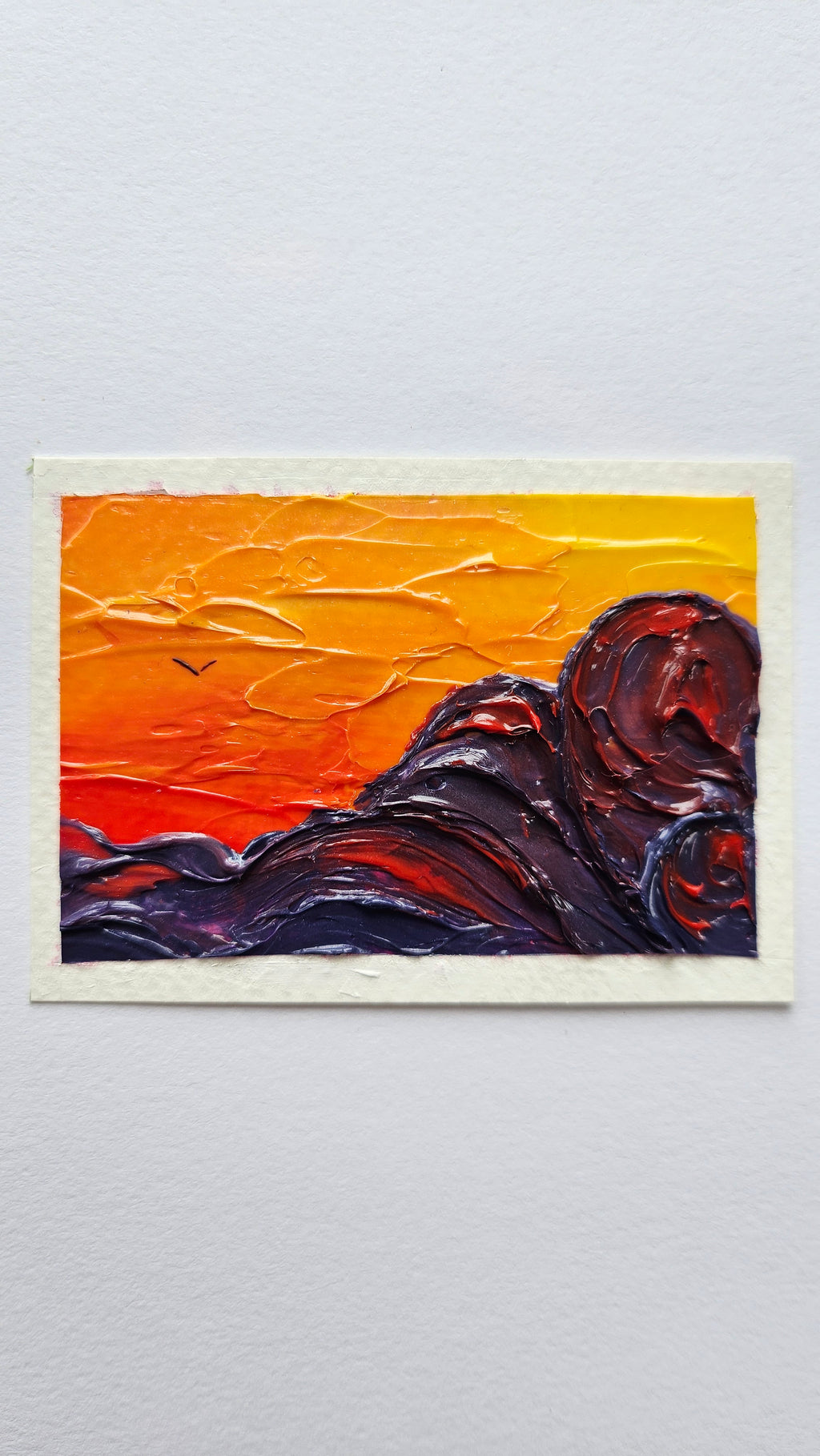 Mini painting of clouds at sunset