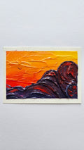 Mini painting of clouds at sunset