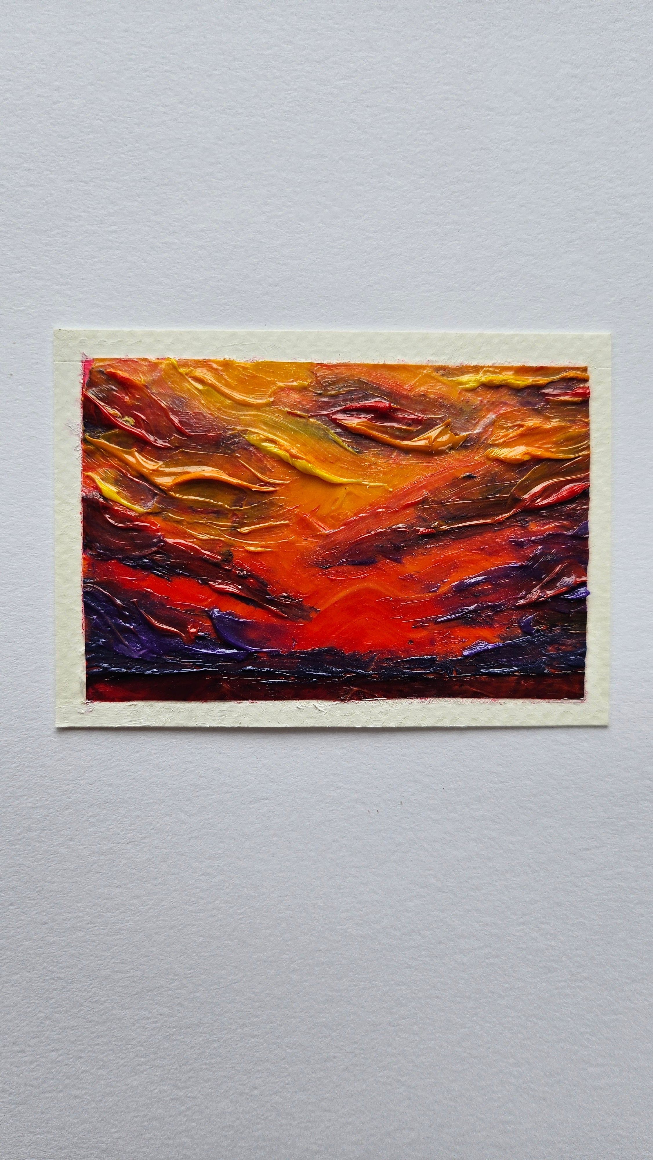 Mini painting of a bloodred sunset