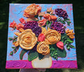 Painting of an orange, yellow, and purple bouquet