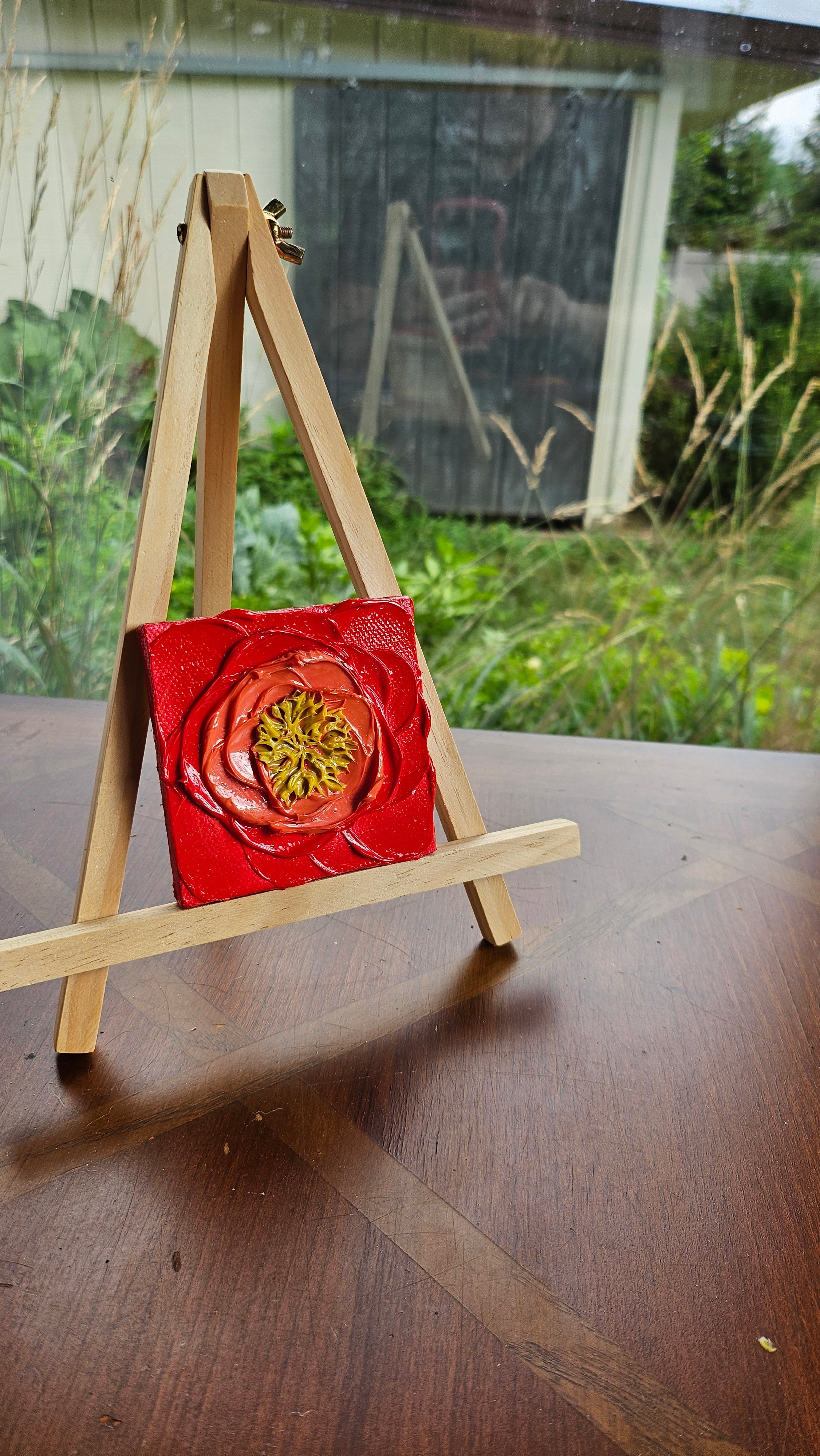 Mini painting of a red peony close up