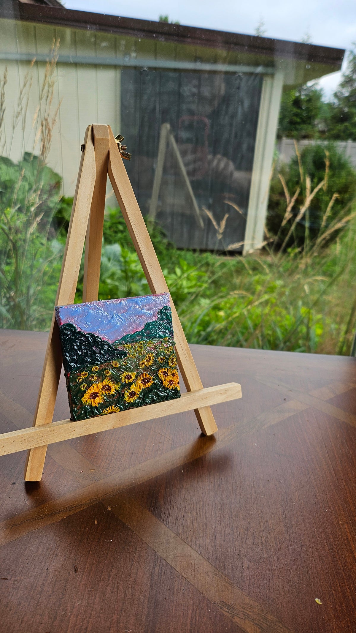 Mini painting of a field of sunflowers