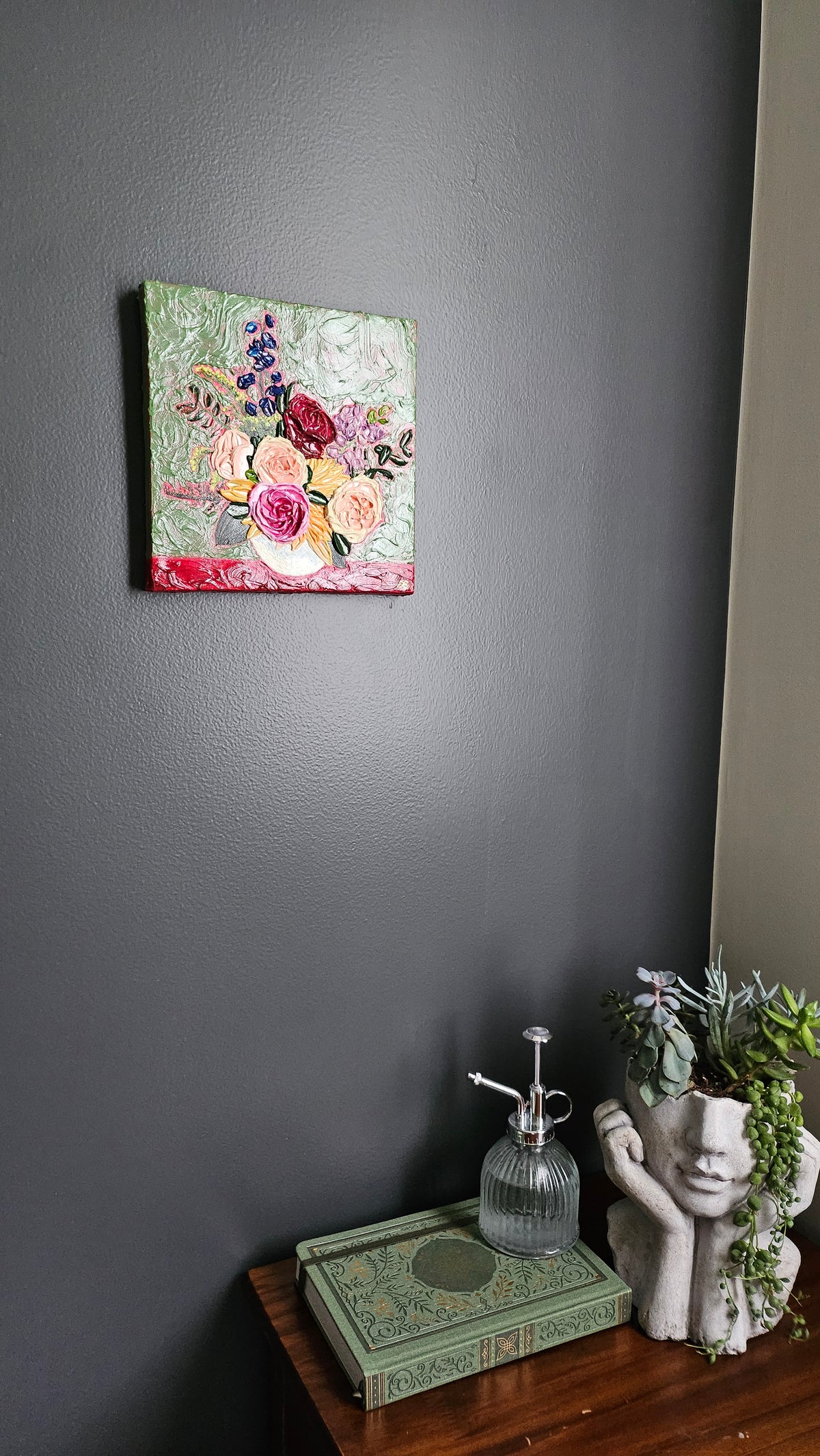 Painting of a pink, red, and blue bouquet