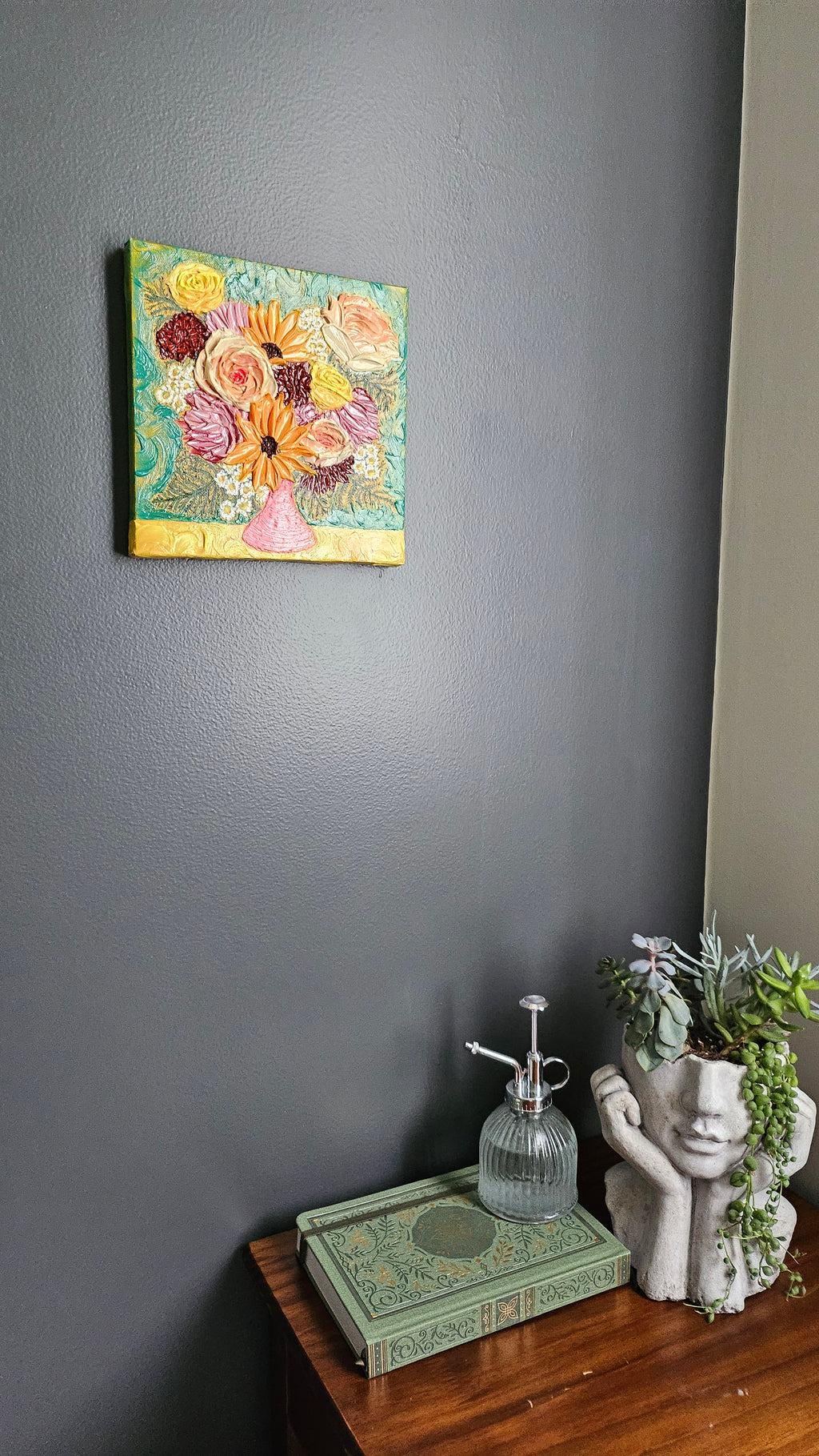Painting of a pink, yellow, and purple bouquet