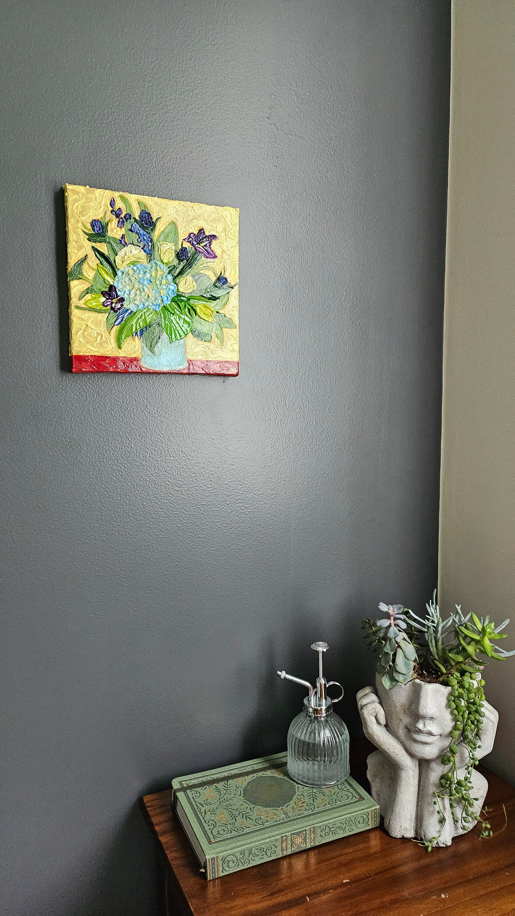 Painting of a blue and purple bouquet