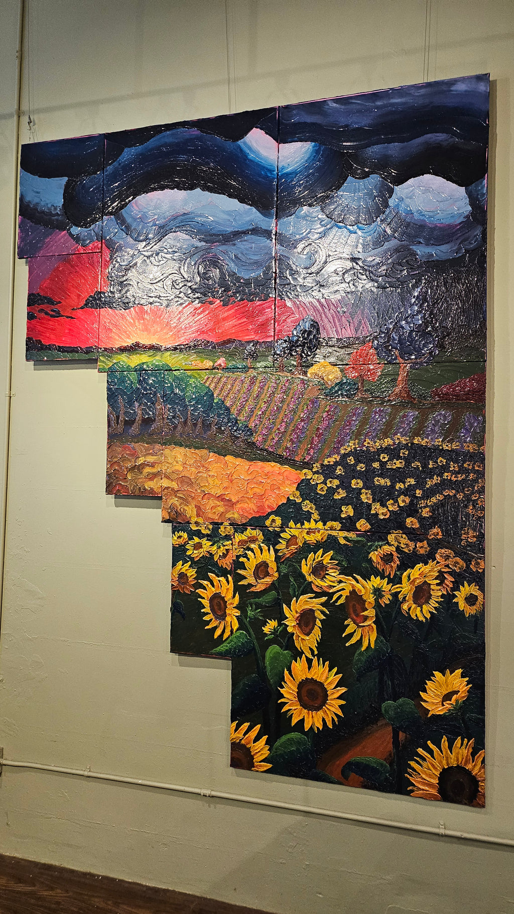 Painting of a field of sunflowers during a thunderstorm