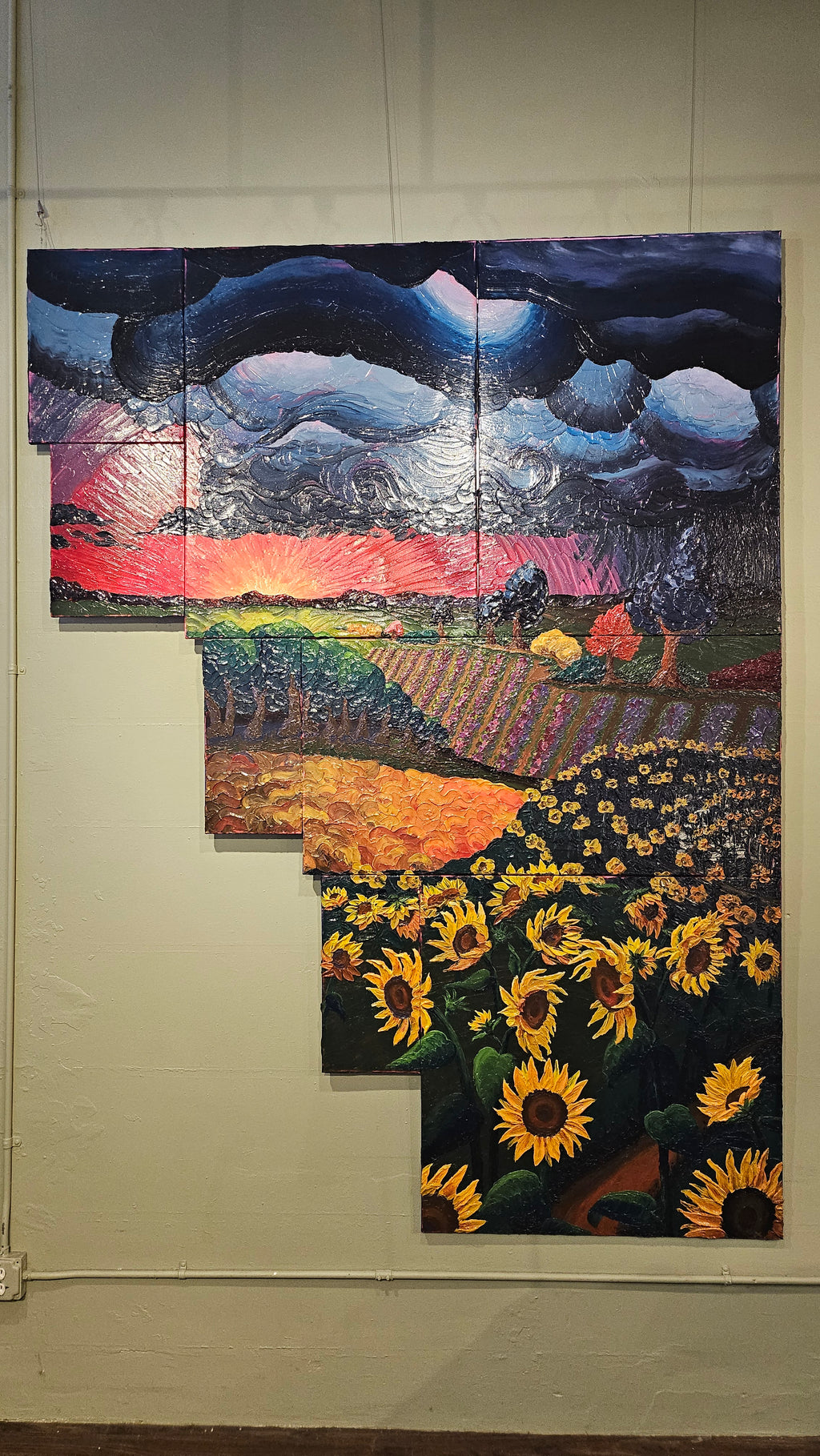 Painting of a field of sunflowers during a thunderstorm