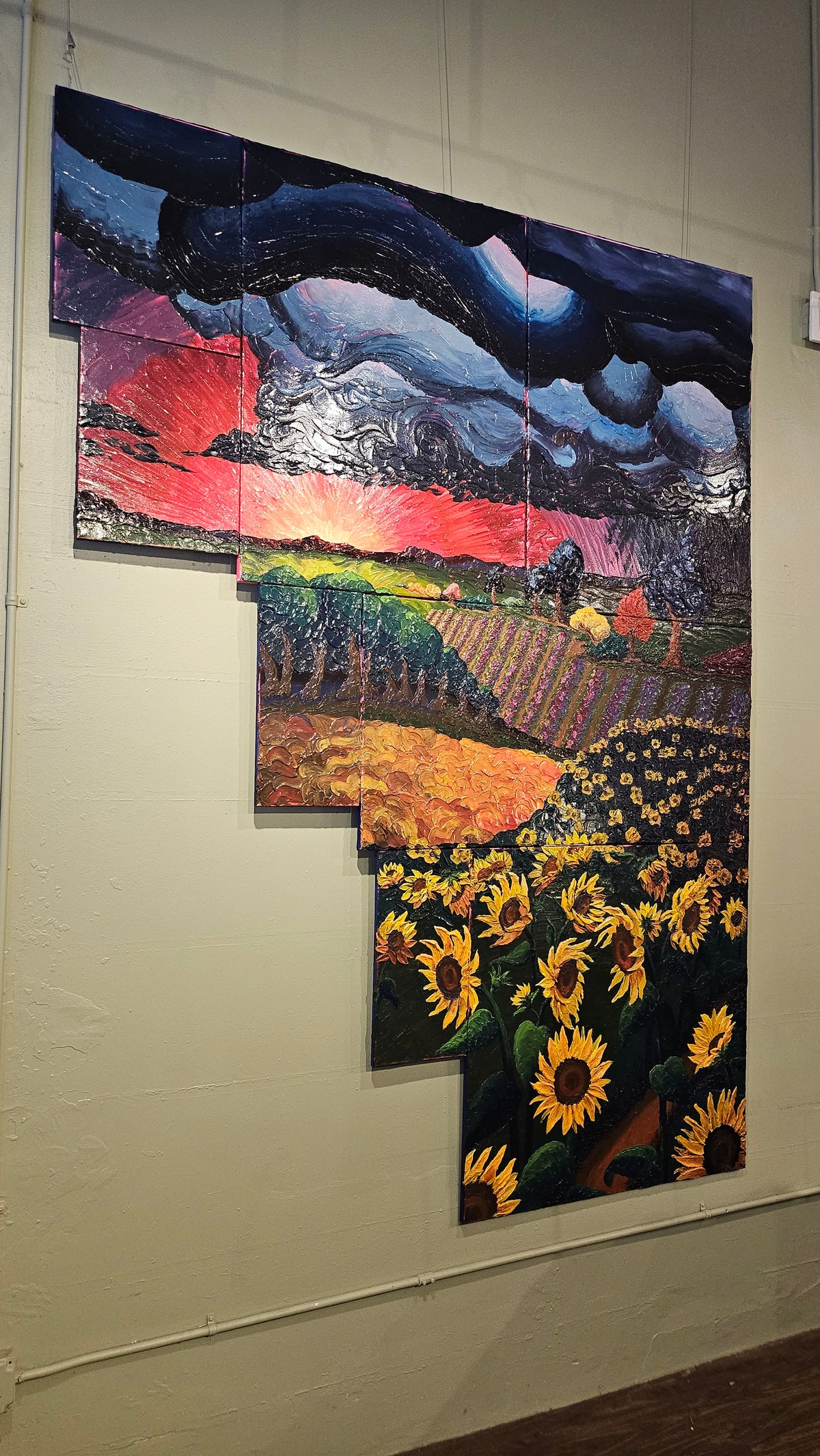 Painting of a field of sunflowers during a thunderstorm