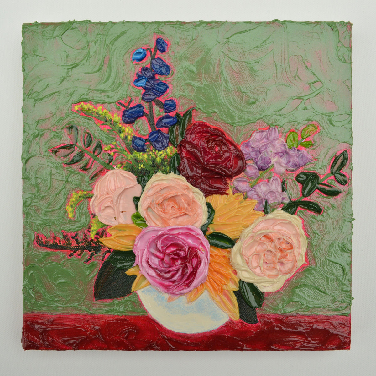 Painting of a pink, red, and blue bouquet