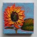 Mini painting of a sunflower and a blue sky