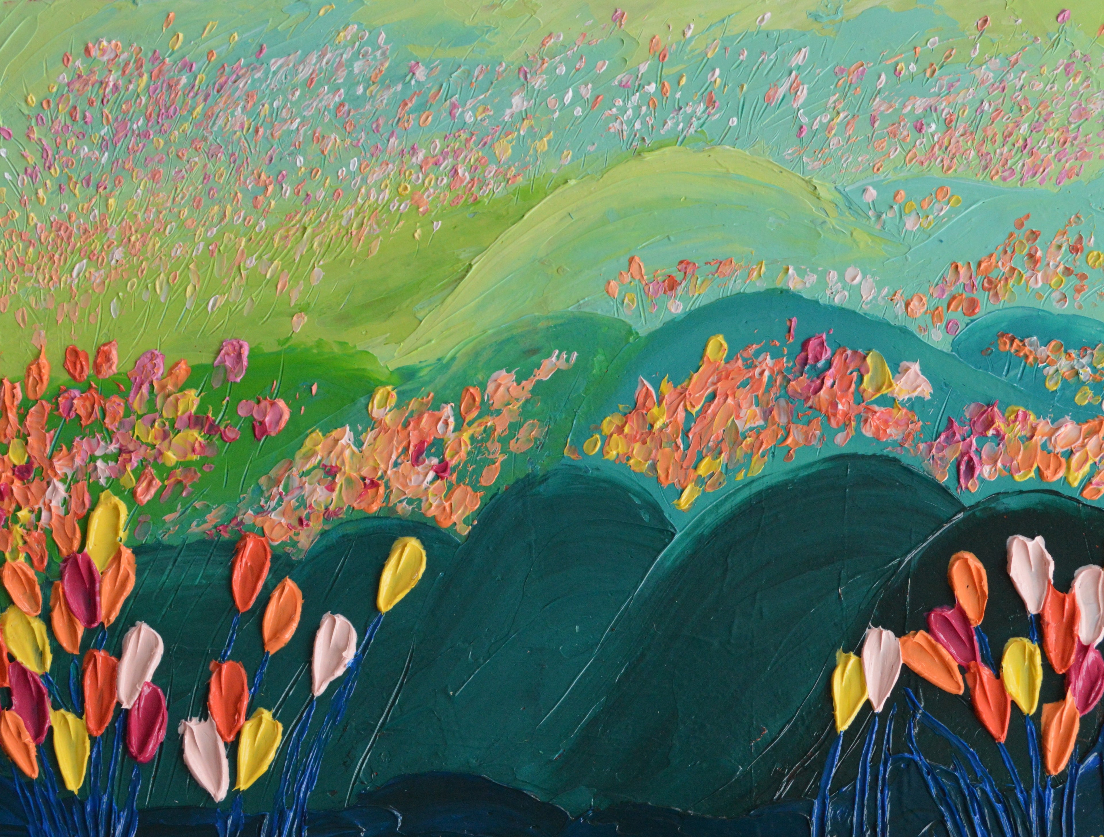 Thick floral blooms on a field of light green to teal-colored grass.