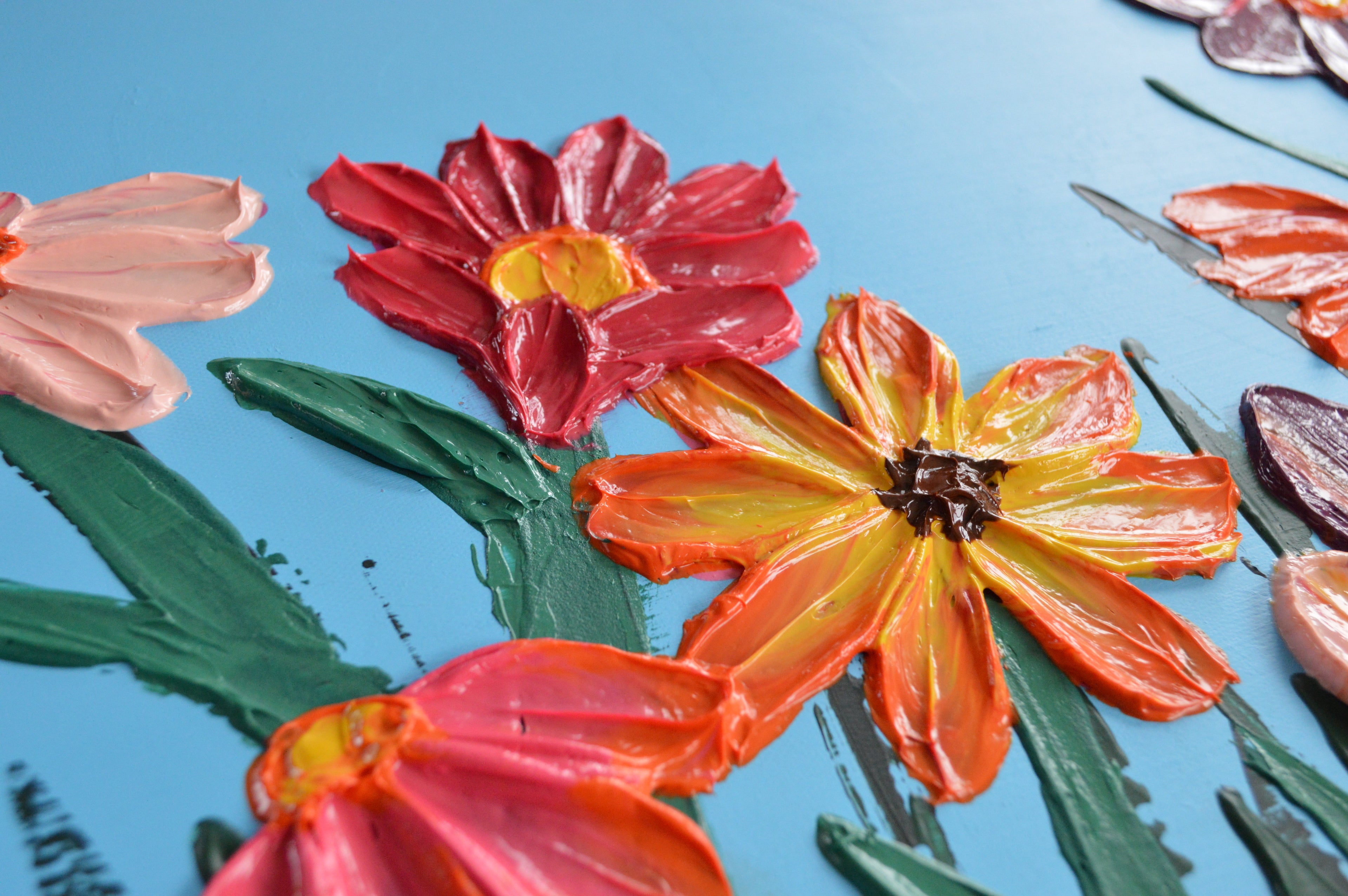 Colorful floral arrangement on a blue background